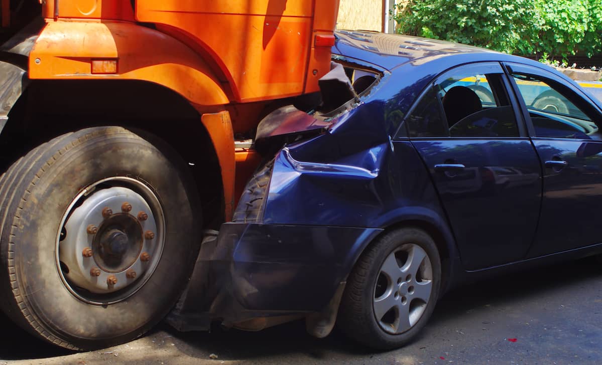 18-wheeler truck rear-ending a car | Burg Simpson