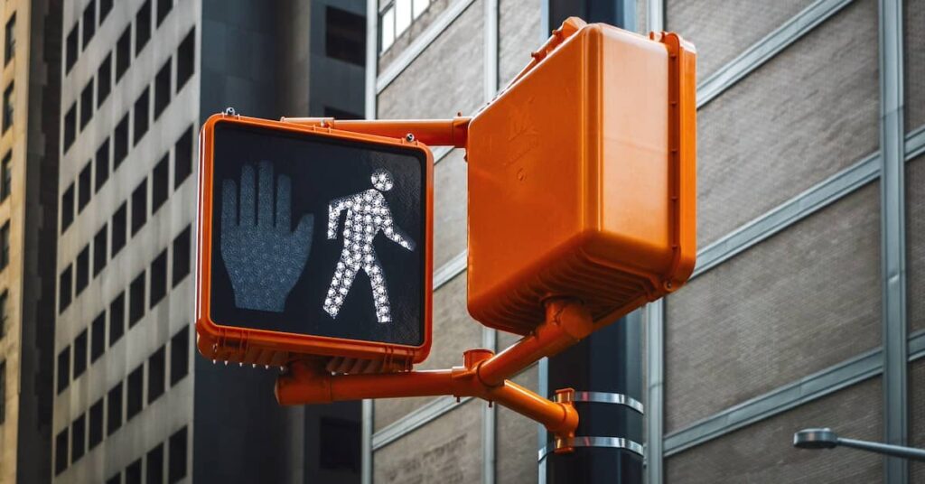 pedestrian accident lawyers - Walk signal for pedestrians on traffic light | Burg Simpson