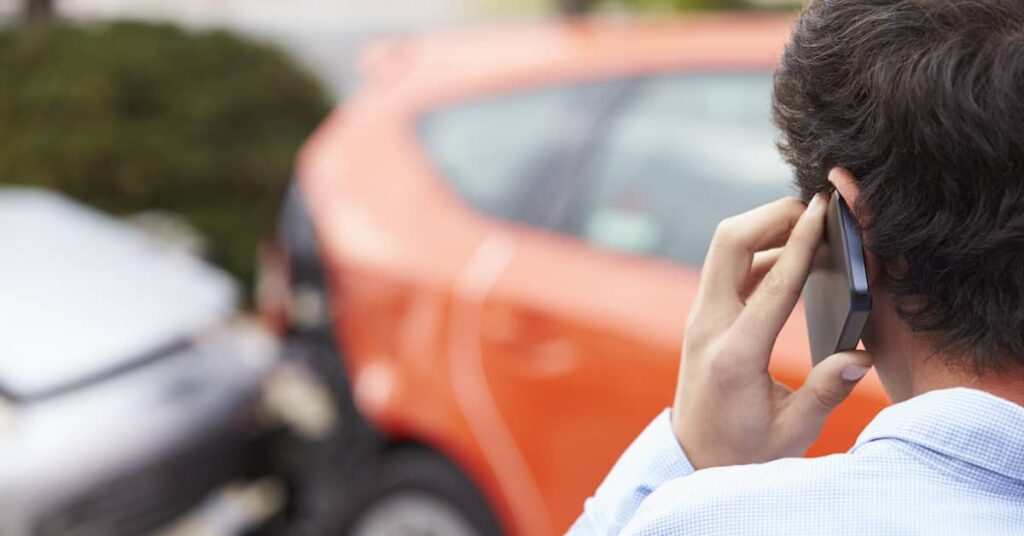 Young man reporting a car crash in Denver, Colorado | Burg Simpson