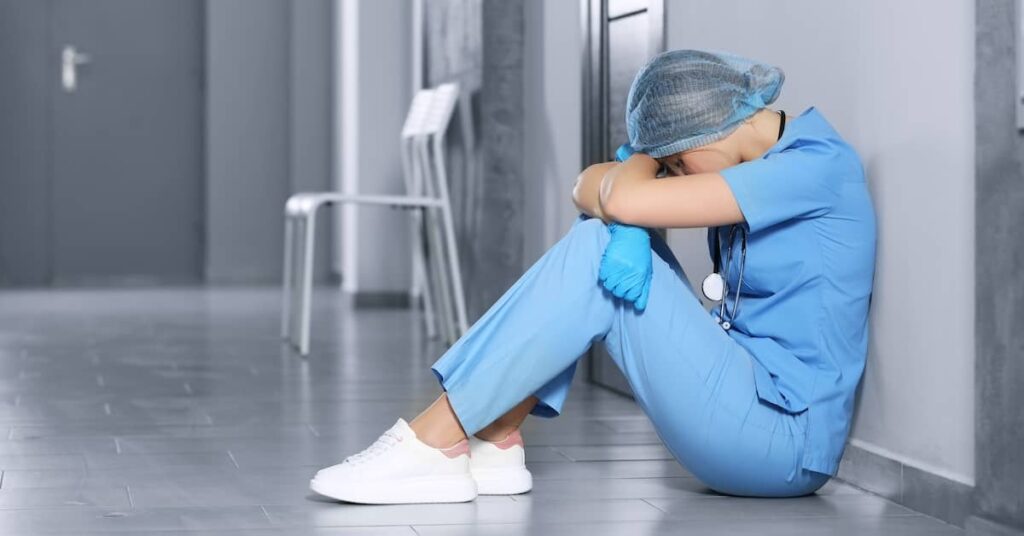 Female doctor distraught after medical malpractice | Burg Simpson