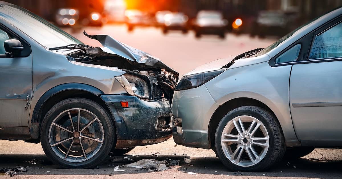 Two cars involved in a head-on collision | Burg Simpson