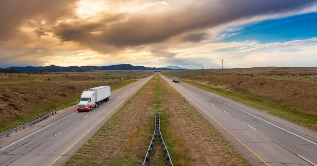 A semi truck at the I-25 interstate highway in Colorado | Burg Simpson