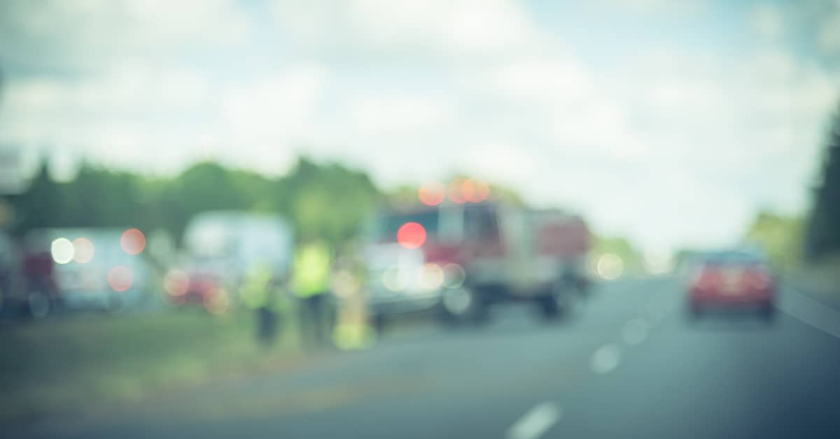 Truck accident scene with first responders | Burg Simpson