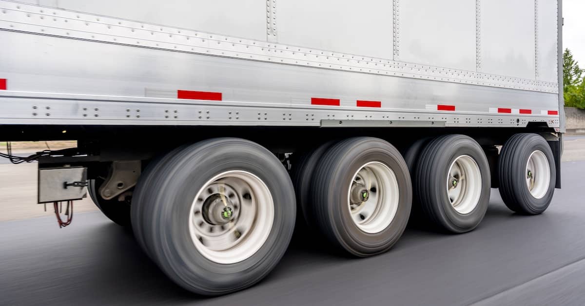 Back end of a semi-truck trailer | Burg Simpson