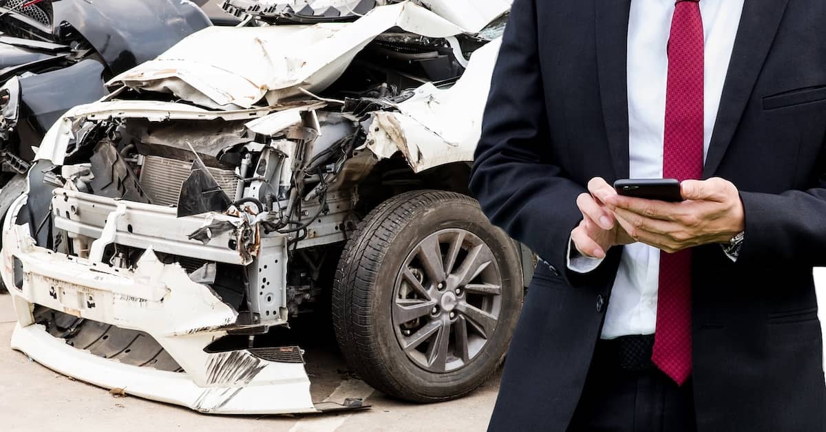 Insurance adjuster calculating the value of a settlement after a serious car accident | Burg Simpson